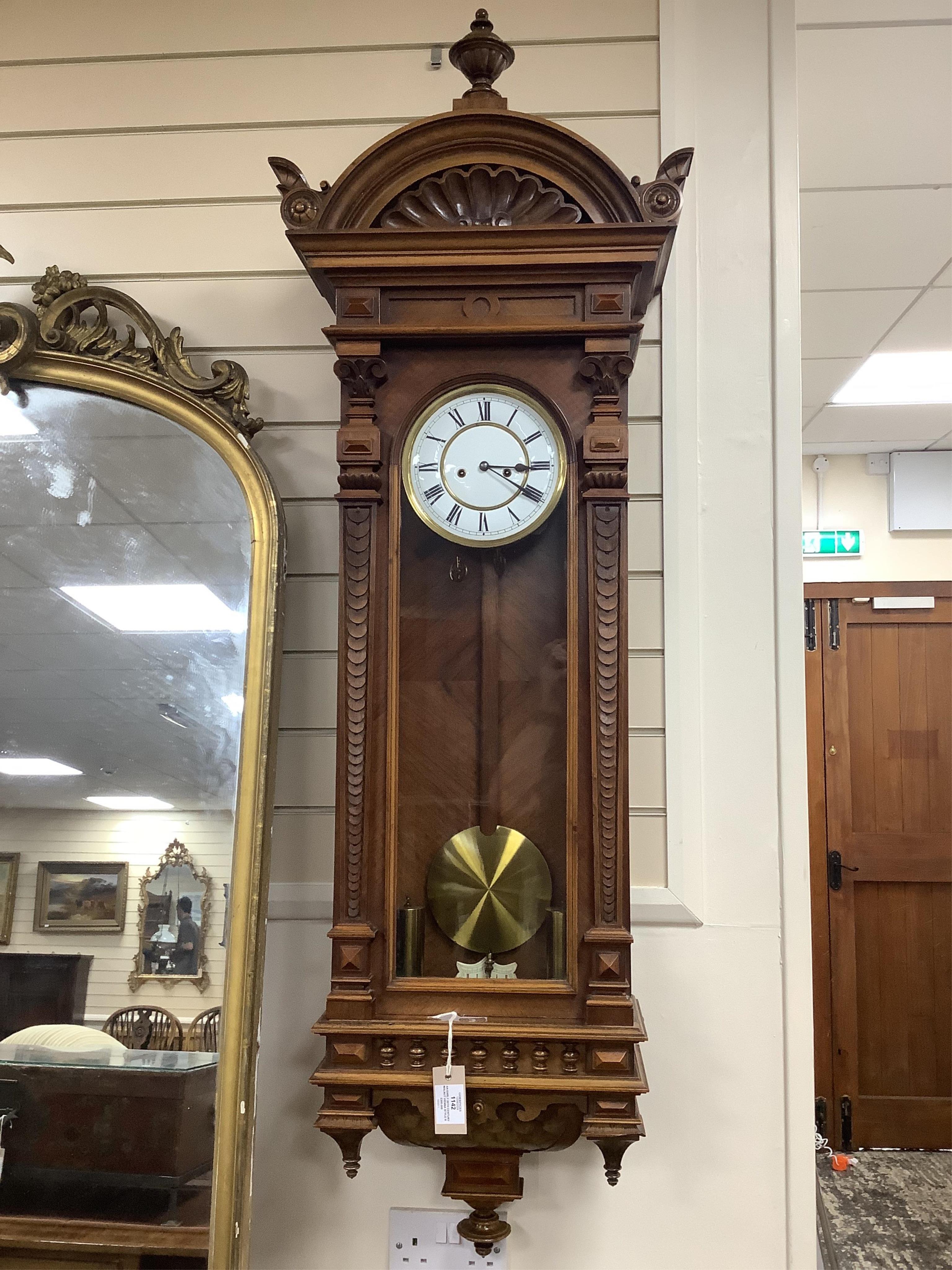 An early 20th century walnut Vienna style regulator wall clock, height 140cm. Condition - good